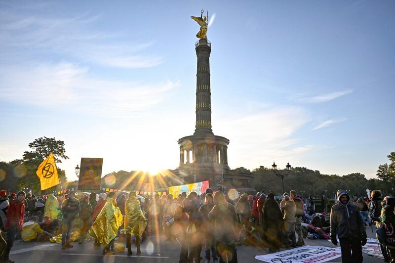 Extinction Rebellion protesters block the roads around the Victory Column to mark the beginning of demonstrations in Berlin. AFP
