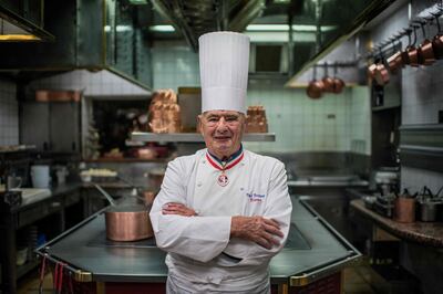 French chef Paul Bocuse, at Collonges au Mont d'Or, works in l'Aubergede Pont de Collonges kitchen, during a culinary work shop, in Mont d'Or, on November 9, 2012. He died in 2018. AFP