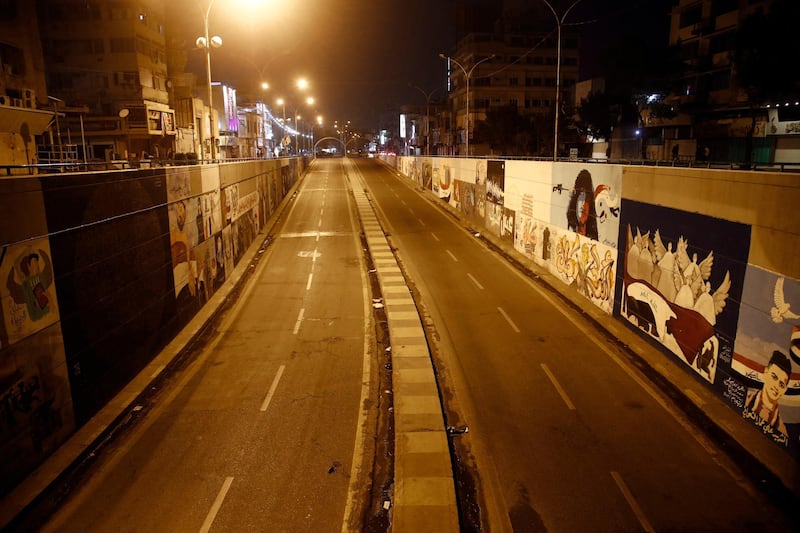 The Saadoun tunnel in Baghdad is empty after the start of a new curfew in Iraq to prevent the spread of Covid-19.  AP Photo