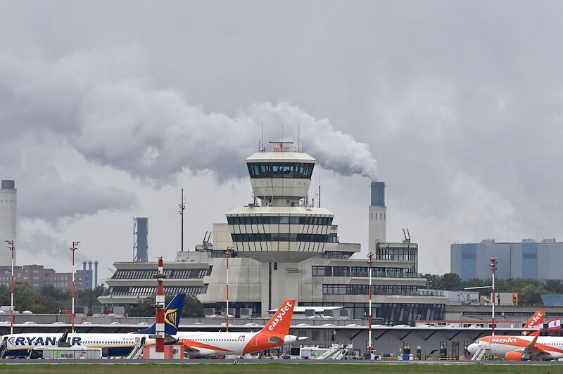 The main terminal of Berlin's Tegel airport and planes of EasyJet and Ryanair on the tarmac. AFP