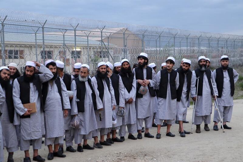 Newly freed Taliban prisoners line up at Bagram prison, north of Kabul, Afghanistan April 11, 2020. Picture taken April 11, 2020. National Security Council of Afghanistan/Handout via REUTERS   THIS IMAGE HAS BEEN SUPPLIED BY A THIRD PARTY. NO RESALES. NO ARCHIVES