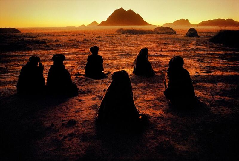 Kuchi nomads at prayer, 1992. Copyright ©Steve McCurry / Magnum Photos