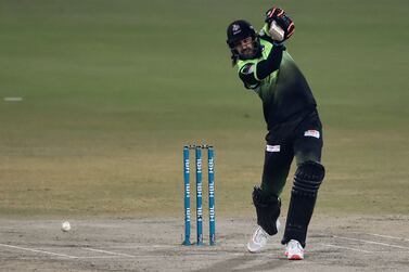 Lahore Qalandars' David Wiese plays a shot during the Pakistan Super League (PSL) Twenty20 final cricket match between Lahore Qalandars and Multan Sultans at the Gaddafi Cricket Stadium in Lahore on February 27, 2022.  (Photo by Arif ALI  /  AFP)