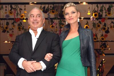 FILE: Philip Green, the billionaire owner of Arcadia Group Ltd., and model Kate Moss, greet the media and awaiting crowds at the opening of the Topshop store in New York, U.S., on Thursday, April 2, 2009. Arcadia Group, the retail empire controlled by Green is likely to file for administration in the U.K. as early as next week, putting 13,000 jobs at risk and about 500 stores across the country at risk. Photographer: Rick Maiman/Bloomberg