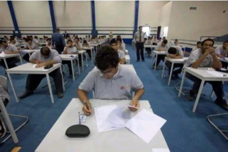 Pupils sit for an exam at the Applied Technology High School in Al Qusais, where they learn how important their contribution is to the UAE.