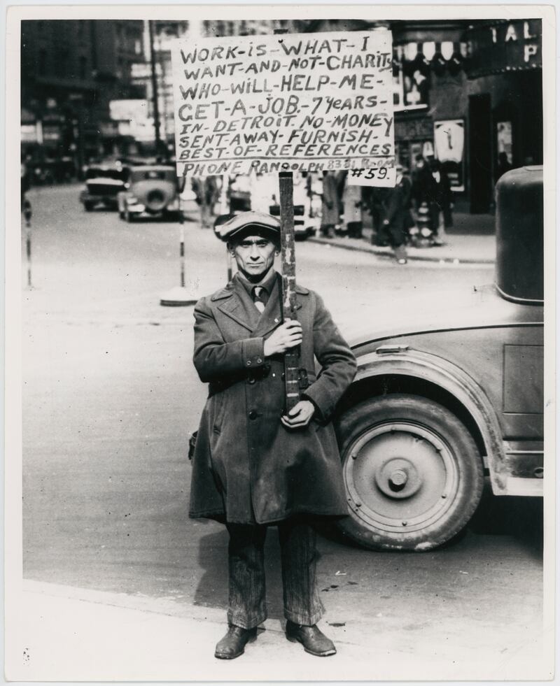 Unemployed man with sign asking for work in Detroit, Michigan in 1932. Photo: US Holocaust Memorial Museum