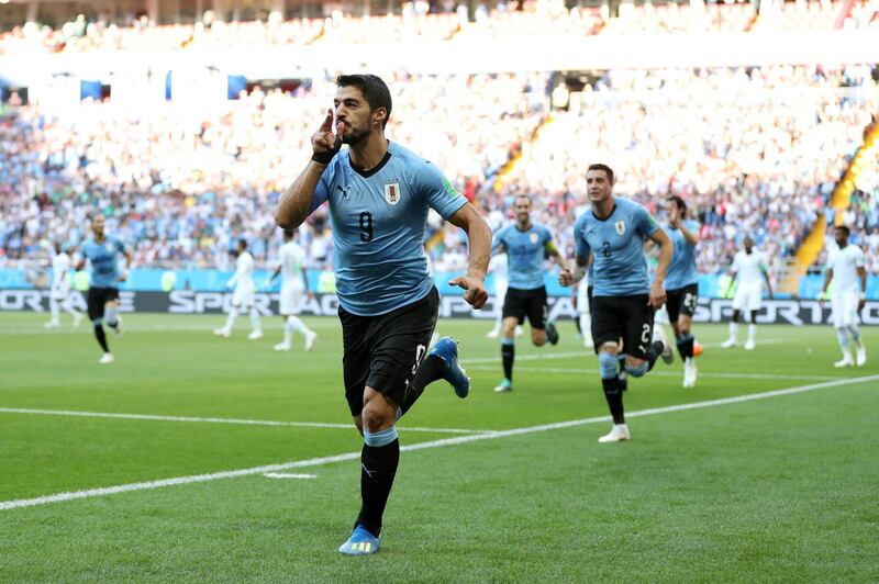 ROSTOV-ON-DON, RUSSIA - JUNE 20:  Luis Suarez of Uruguay celebrates after scoring his team's first goal during the 2018 FIFA World Cup Russia group A match between Uruguay and Saudi Arabia at Rostov Arena on June 20, 2018 in Rostov-on-Don, Russia.  (Photo by Ryan Pierse/Getty Images)