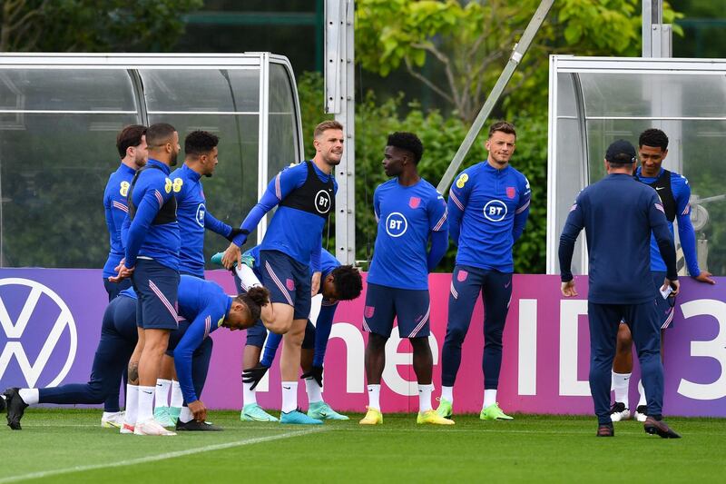 England midfielder Jordan Henderson, centre, training with teammates. AFP
