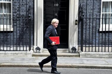 Britain's then-Foreign Secretary Boris Johnson walks past number 10, on his way to the Department for Exiting the EU at No 9 in Downing Street in London, June 7, 2018. Reuters