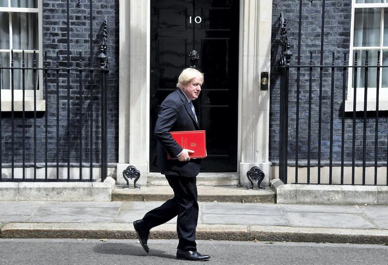 Britain's Foreign Secretary Boris Johnson walks past number 10, on his way to the Department for Exiting the EU at No 9 in Downing Street in London, June 7, 2018. REUTERS/Toby Melville