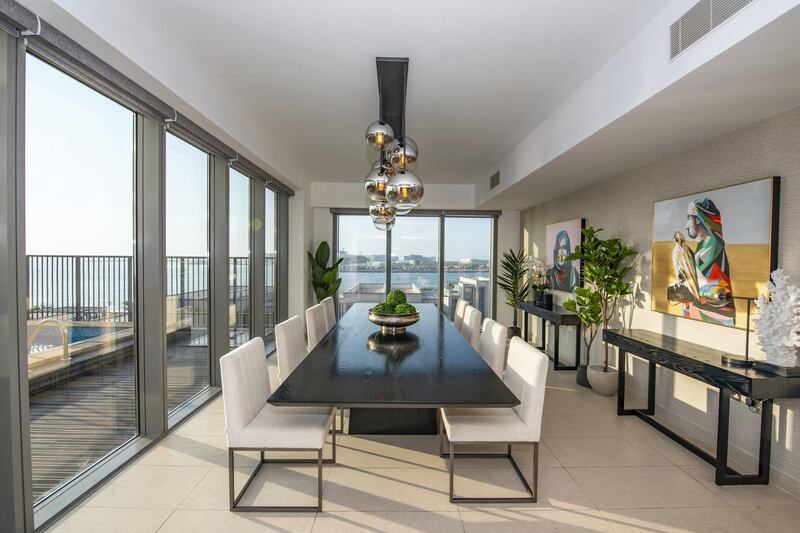 The dining room overlooks the pool - and the sea.