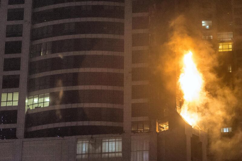 DUBAI. UNITED ARAB EMIRATES, 04 AUGUST 2017. A massive fire rips through The Marina Torch tower's southern corner. (Photo: Antonie Robertson) Journalist: None. Section: National.