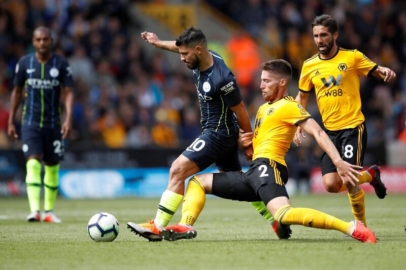 Manchester City's Sergio Aguero in action with Wolverhampton Wanderers' Matt Doherty. Action Images via Reuters