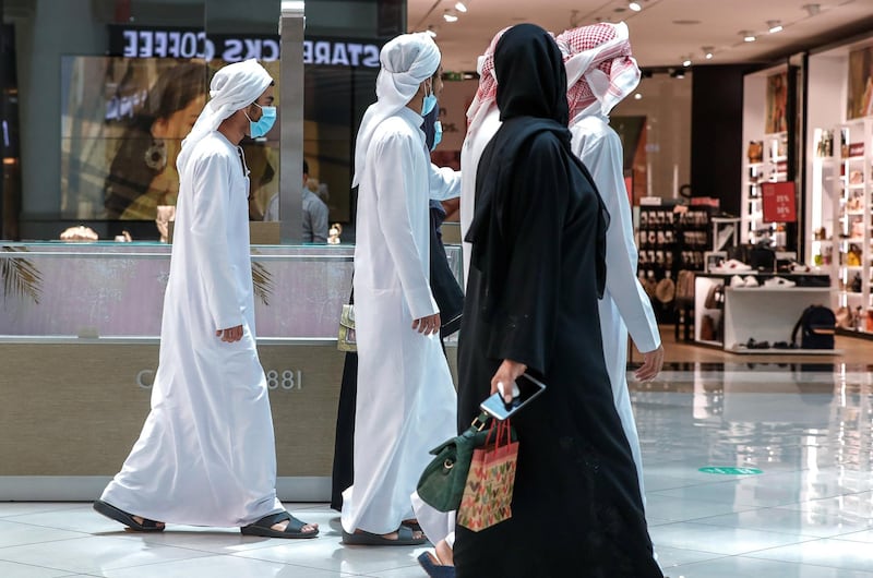 Abu Dhabi, United Arab Emirates, August 2, 2020.   
 A family goes malling at Al Wahda Mall on the last day of Eid Al Adha. 
Victor Besa /The National
Section: NA
For:  Standalone/Stock Images