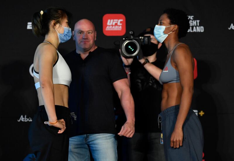 ABU DHABI, UNITED ARAB EMIRATES - JANUARY 15: (L-R) Opponents Wu Yanan of China and Joselyne Edwards of Panama face off during the UFC weigh-in at Etihad Arena on UFC Fight Island on January 15, 2021 in Abu Dhabi, United Arab Emirates. (Photo by Jeff Bottari/Zuffa LLC)