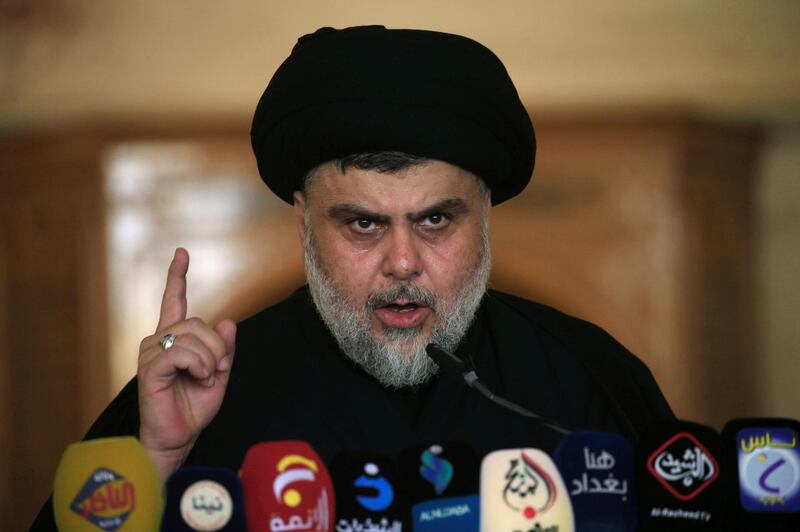 Iraqi Shi'ite radical leader Muqtada al-Sadr delivers a sermon to worshippers during Friday prayers at the Kufa mosque near Najaf, Iraq September 21, 2018.  REUTERS/Alaa Al-Marjani