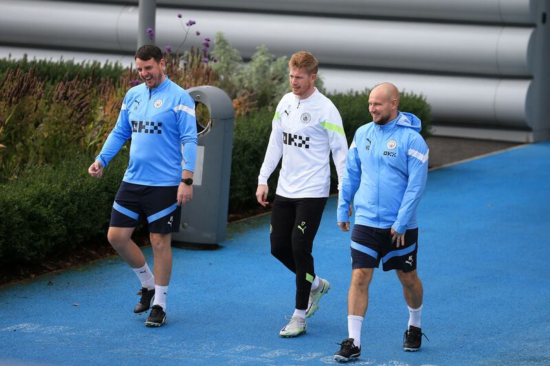 Manchester City's Belgian midfielder Kevin De Bruyne on his way to take part in a training session. AFP
