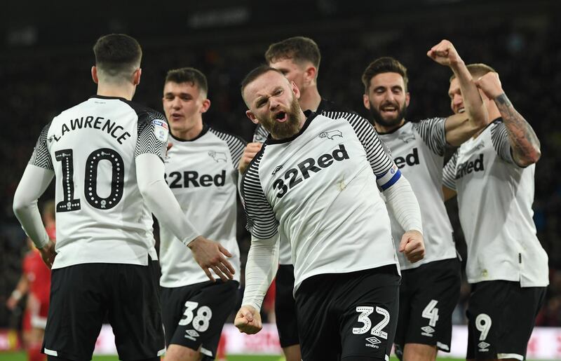 Derby County's Wayne Rooney celebrates after scoring the opening goal in the Championship match against Fulham at Pride Park Stadium on February 21. Getty