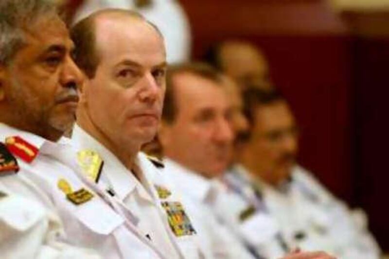 US Vice Admiral Kevin Cosgriff (second left), Commander of the US 5th Fleet, sits with Rear Admiral Ahmed Mohammed al-Sabab al Tenaji (left), commander of the UAE Navy, at a Gulf Naval Commander meeting in Abu Dhabi  today.