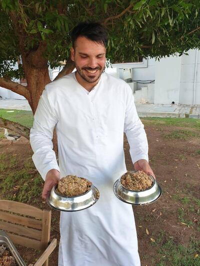 Jamal Al Breiki distributes leftover brunch food to animals in Abu Dhabi. Courtesy Jamal Al Breiki