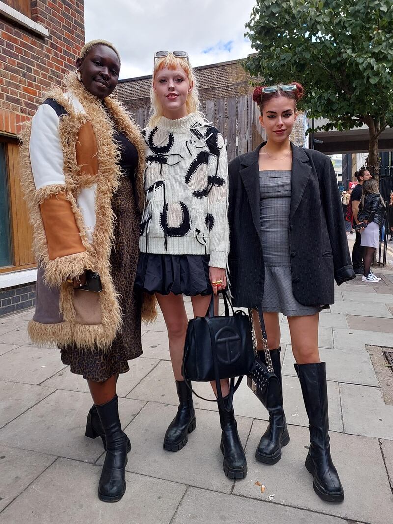 A vintage sheepskin jacket, and an oversized jumper with a kilted miniskirt. 