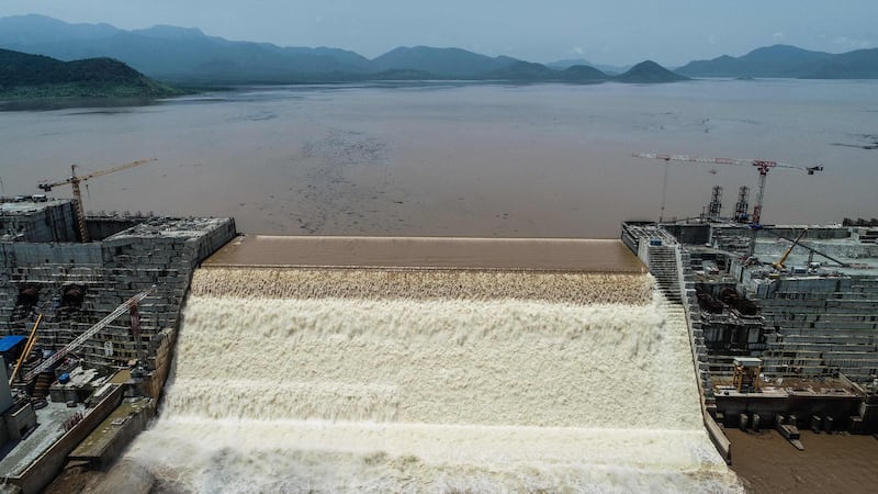 This handout picture taken on July 20, 2020, and released by Adwa Pictures on July 27, 2020, shows an aerial view Grand Ethiopian Renaissance Dam on the Blue Nile River in Guba, northwest Ethiopia. Ethiopia said on July 21 it had hit its first-year target for filling the Grand Ethiopian Renaissance Dam, a concrete colossus 145 metres (475 feet) high that has stoked tensions with downstream neighbours Egypt and Sudan.
 - RESTRICTED TO EDITORIAL USE - MANDATORY CREDIT "AFP PHOTO / ADWA PICTURES / YIRGA MENGISTU" - NO MARKETING NO ADVERTISING CAMPAIGNS - DISTRIBUTED AS A SERVICE TO CLIENTS


 / AFP / Adwa Pictures / Adwa Pictures / Yirga MENGISTU / RESTRICTED TO EDITORIAL USE - MANDATORY CREDIT "AFP PHOTO / ADWA PICTURES / YIRGA MENGISTU" - NO MARKETING NO ADVERTISING CAMPAIGNS - DISTRIBUTED AS A SERVICE TO CLIENTS


