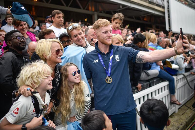 Ben Stokes signs autographs during the England ICC World Cup Victory Celebration at The Kia Oval in London, England.Getty Images