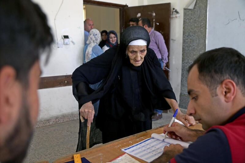 A Kurdish elderly woman in traditional clothes prepares to vote during the Kurdistan parliamentary election at a polling station in Erbil, the capital of the Kurdistan Region in Iraq. With over three million people eligible to vote, the semi-autonomous region is voting on its parliamentary elections a year after a failed bid for independence from Iraq.  EPA