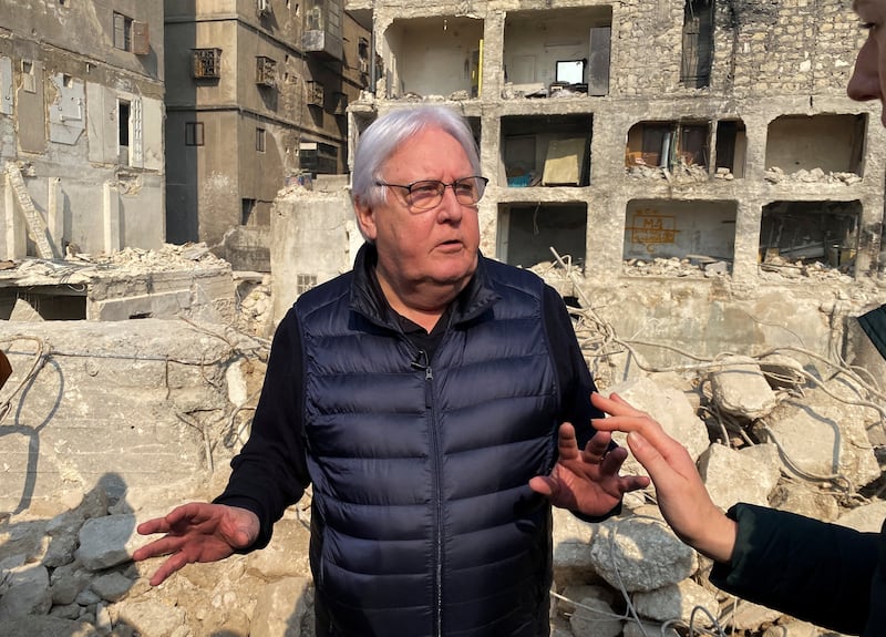 UN emergency relief co-ordinator Martin Griffiths stands amid quake-damaged buildings in Aleppo, Syria. Reuters
