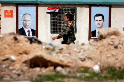 FILE PHOTO: A Syrian soldier loyal to President Bashar al Assad is seen outside eastern Ghouta, in Damascus, Syria February 28, 2018. To match Special Report RUSSIA-FLIGHTS/ REUTERS/Omar Sanadiki/File Photo