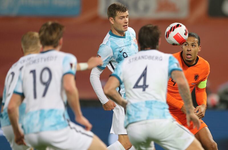 Norway's Alexander Sorloth in action with Netherlands' Virgil van Dijk. AP Photo