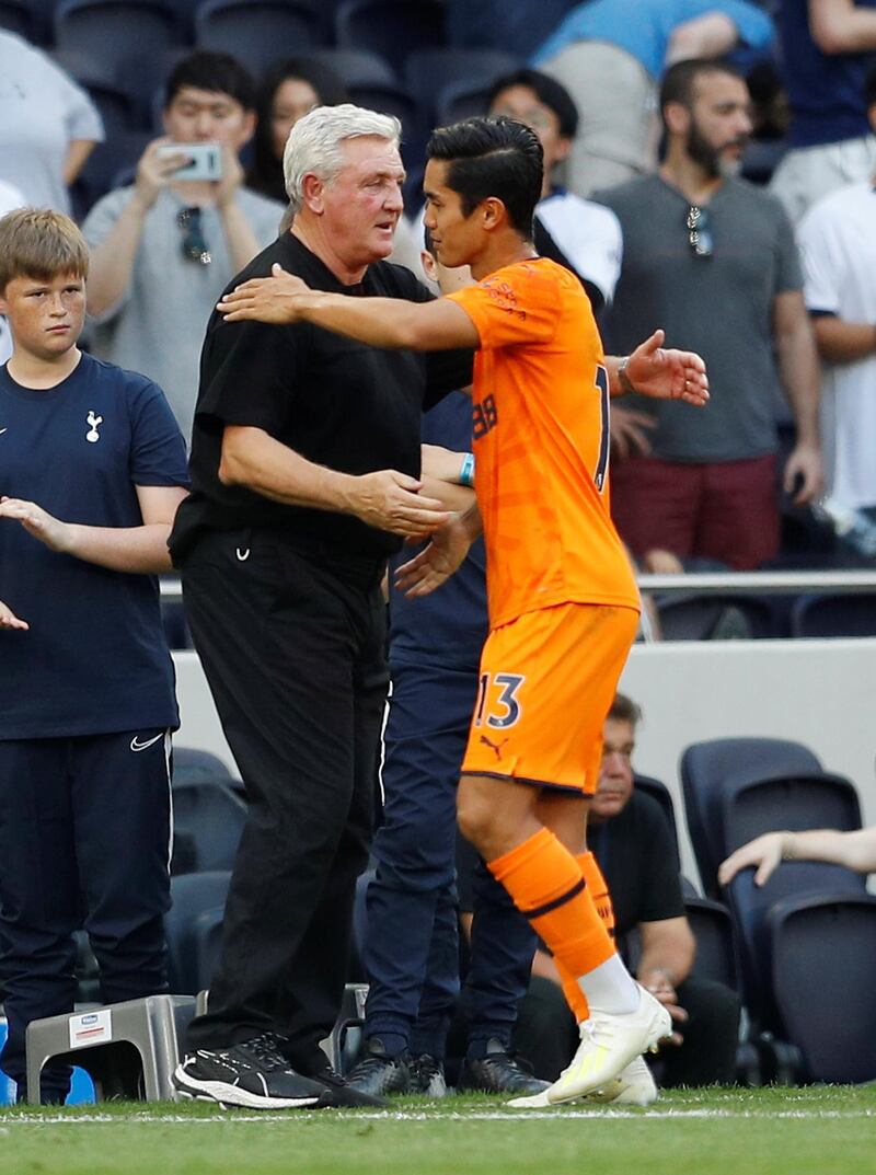Steve Bruce and Newcastle United's Yoshinori Muto after the match. Reuters
