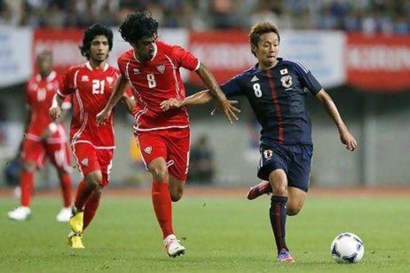 The UAE national team in action against Japan during a friendly match