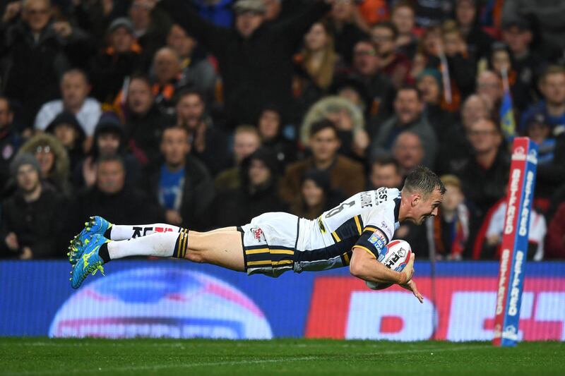 Danny McGuire of Leeds Rhinos scores the second try during the Betfred Super League Grand Final match against Castleford Tigers at Old Trafford in England. Gareth Copley / Getty Images