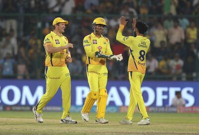 Chennai Super Kings Ravindra Jadeja, right, celebrates the wicket of Delhi Daredevils Glenn Maxwell during the VIVO IPL Twenty20 cricket match in New Delhi, India, Friday, May 18, 2018. (AP Photo/Manish Swarup)