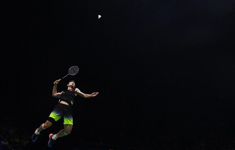 Shi Yuqi of China hits a shot during the badminton World Championships in Nanjing, China. Johannes Eisele / AFP Photo