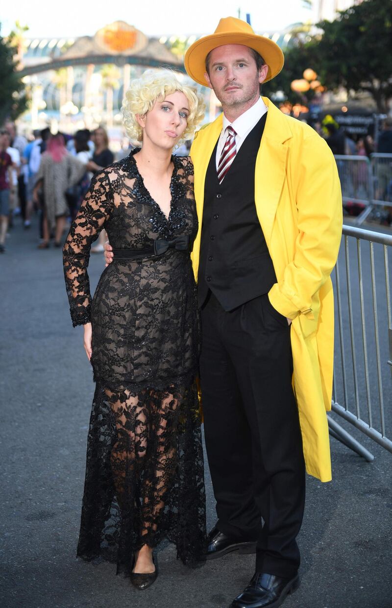 Cosplayers David Tracy, right, and Hayley Tracy portray Dick Tracy and Breathless Mahoney. AFP