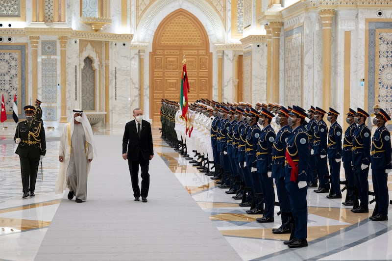Sheikh Mohamed and Mr Erdogan are greeted by a military guard of honour.