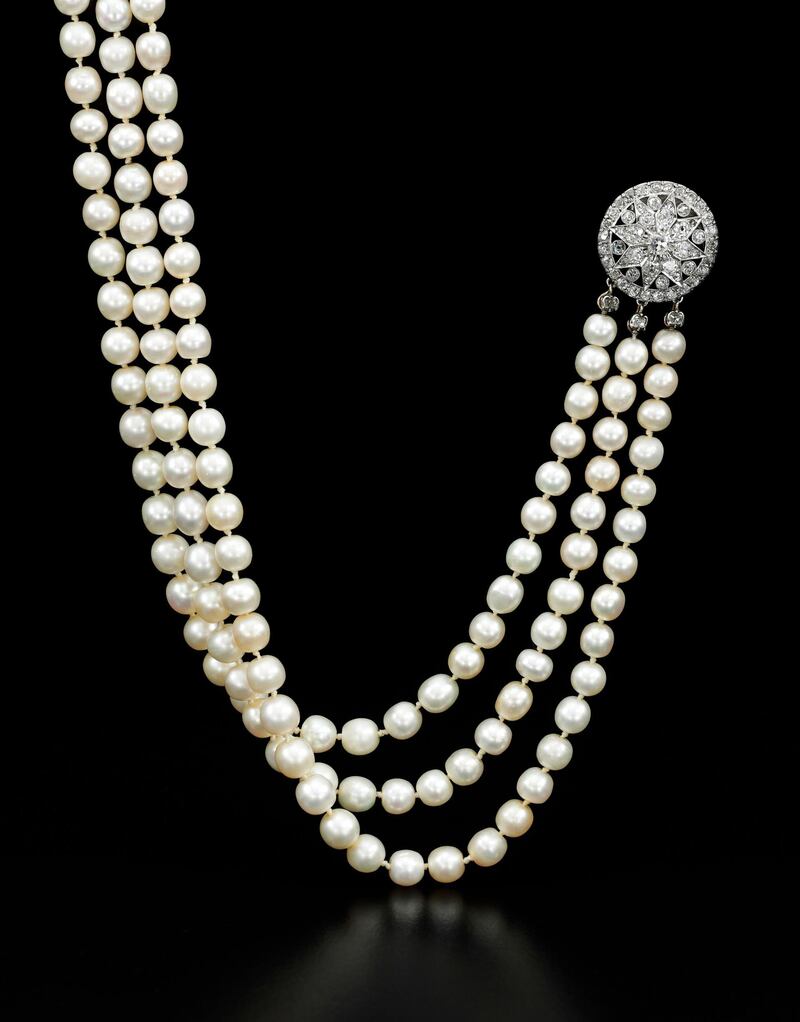 This undated handout photo released by Sotheby's Geneva shows a natural pearl and diamond necklace that once belonged to Marie Antoinette, expected to sell for $200,000-300,000. One of the most famous royal jewellery collections ever to come to auction will be coming to Sothebyâ€™s in Geneva on 12 Nov. 2018. Entitled â€œRoyal Jewels from the Bourbon-Parma Familyâ€, the auction will span centuries of European history, from the reign of Louis XVI to the fall of the Austro-Hungarian Empire, and will offer fascinating insights into the splendor of one of Europeâ€™s most important royal dynasties. (Sotheby's Geneva via AP)