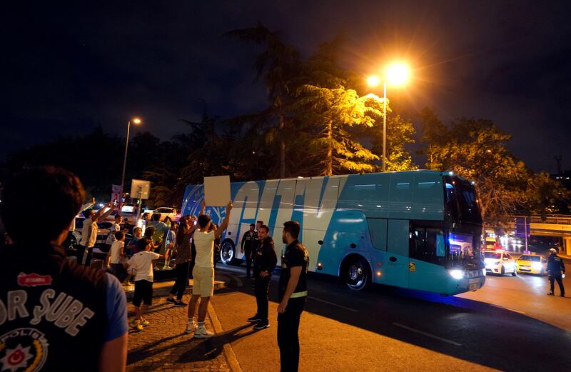 City's team bus arrives at the hotel. PA