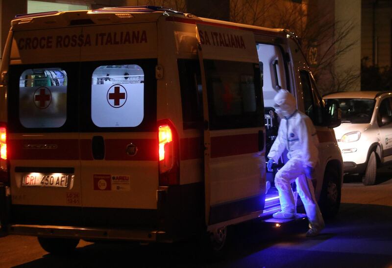 epa08235605 One of the ambulances that transported one of the six people infected by Coronavirus to the Sacco Hospital in Milan, Italy, 21 February 2020. Six people have been reported infected with the novel coronavirus in Italy, all in the region of Lombardy, authorities said. Lombardy Welfare Councilor Gallera during the press conference urged residents in the cities of Lombardy affected by the virus to stay at home as a precautionary measure and avoid all social contact.  EPA/MATTEO BAZZI