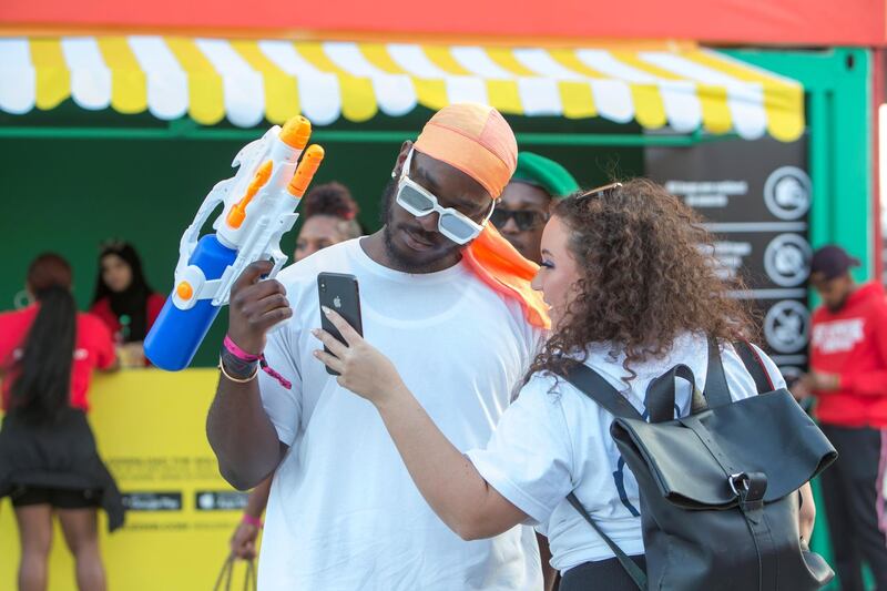 Dubai, United Arab Emirates- Visitors taking photos at the Sole Dubai Festival at D3.  Leslie Pableo for The National for Saeed Saeed's story