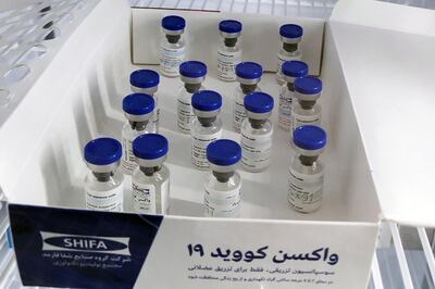 Vials of Iranian domestic coronavirus disease (COVID-19) vaccine candidate are seen during human testing in Tehran, Iran December 29, 2020. Organization of the Execution of Imam Khomeini's Order/WANA (West Asia News Agency) via REUTERS ATTENTION EDITORS - THIS IMAGE HAS BEEN SUPPLIED BY A THIRD PARTY.  THIS PICTURE WAS PROCESSED BY REUTERS TO ENHANCE QUALITY. AN UNPROCESSED VERSION HAS BEEN PROVIDED SEPARATELY.