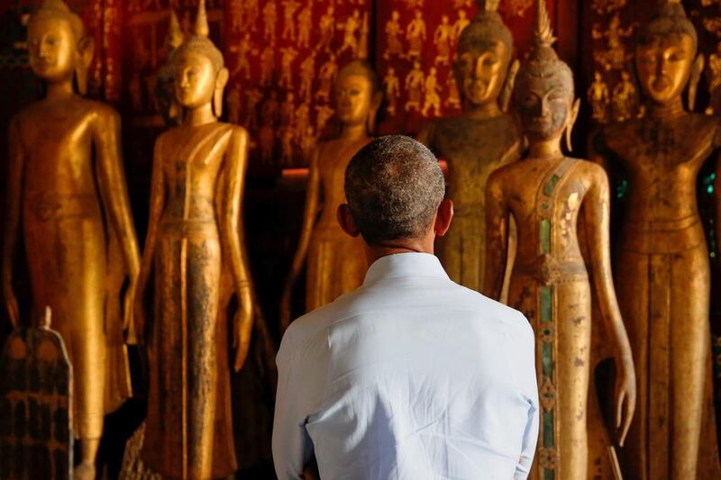 US president Barack Obama visits the Wat Xieng Thong Buddhist temple, alongside his participation in the ASEAN Summit, in Luang Prabang, Laos. Jonathan Ernst / Reuters
