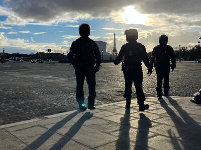 Police officers on patrol in Paris. AP 