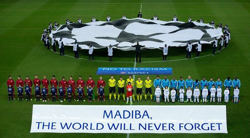 In Spain, Atletico Madrid and Porto paid their respects before play to Mandela. Gonzalo Arroyo Moreno / Getty Images