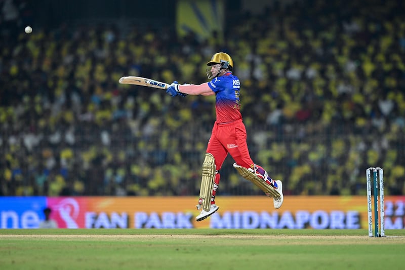 Royal Challengers Bangalore's Anuj Rawat plays a shot on his way to a total of 48 off 25 balls. AFP
