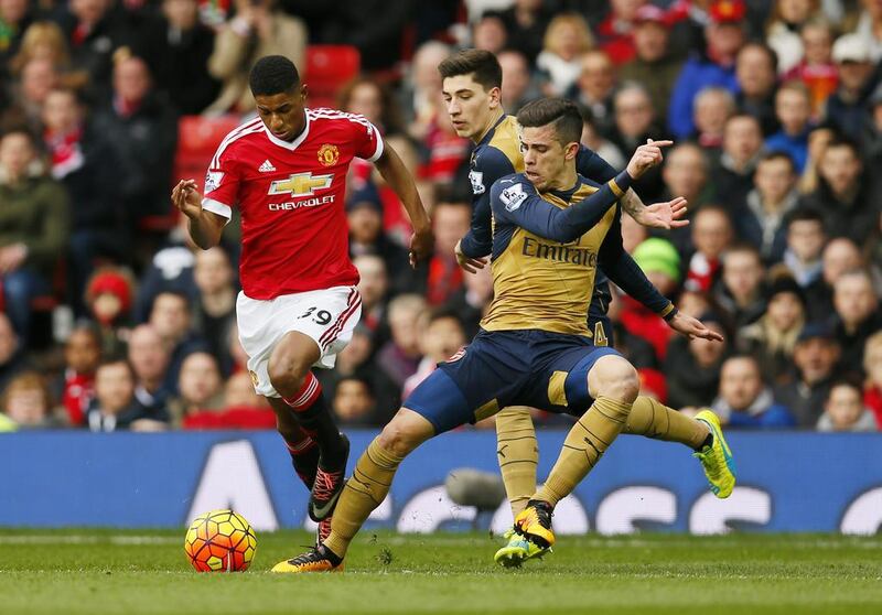 Arsenal’s Hector Bellerin and Gabriel Paulista in action with Manchester United’s Marcus Rashford

Action Images via Reuters / Jason Cairnduff