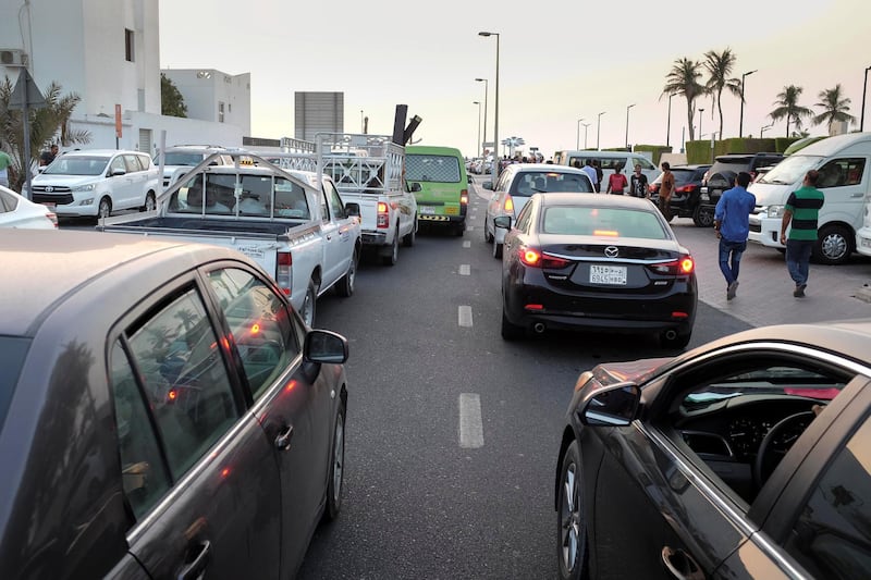 DUBAI, UNITED ARAB EMIRATES. 21 AUGUST 2018. Residents of Dubai enjoy the Eid break in a traffic jam by Sunset Beach near the Burj Al Arab. (Photo: Antonie Robertson/The National) Journalist: None. Section: National.