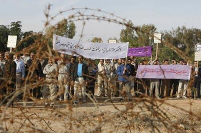 Members of the Iranian opposition group, the People's Mujahadin Organisation of Iran, demonstrate against a proposal to move them from Camp Ashraf, north of Baghdad, where they were installed by Saddam Hussein's regime in 1985.
